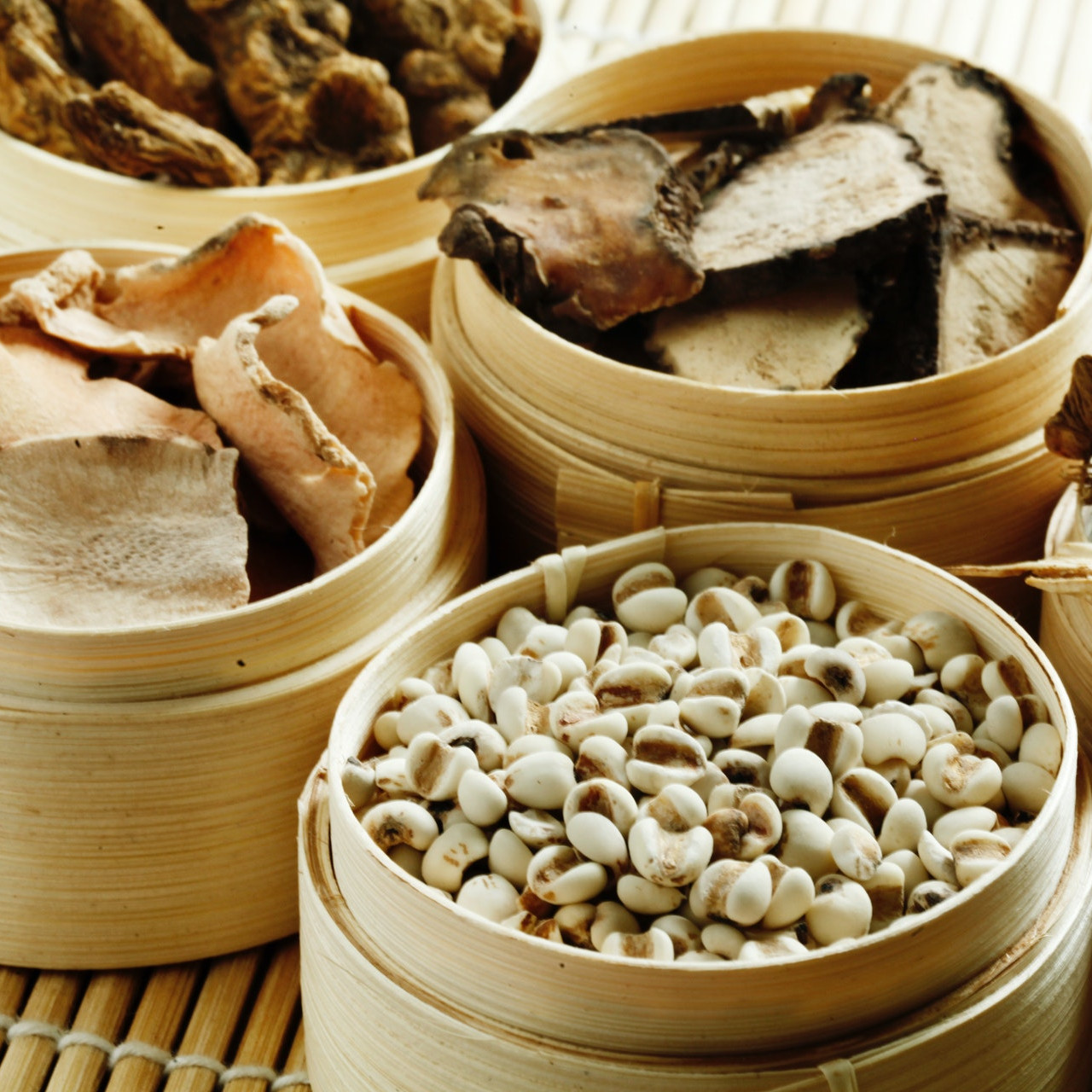 Traditional Chinese Medicine (TCM) Herbs in bamboo containers
